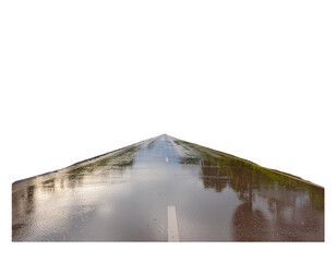 Puddle reflections on a long road creating a dramatic horizon