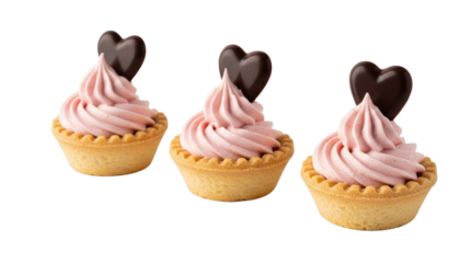 Tartlets with strawberry mousse, topped with chocolate hearts isolated on transparent background