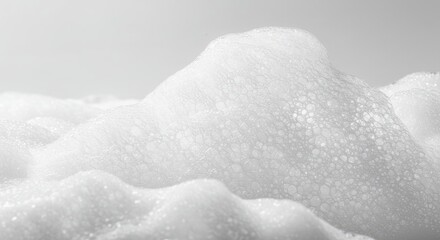 Close up view of white bubbly foam texture abstract background