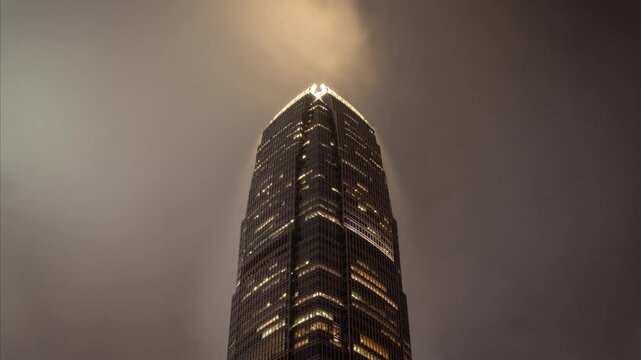 Close up timelapse clip of the International Finance Centre (Tower 2) in Hong Kong at night. The 2 IFC tower is the second-tallest building in Hong Kong