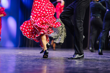 Latvian folk dance performance showcasing vibrant costumes and dynamic movements, capturing the essence of cultural celebration and tradition