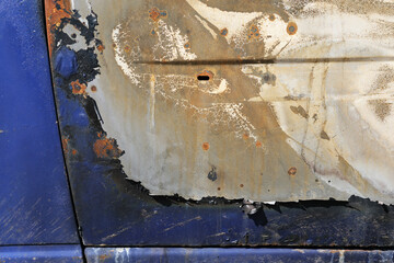 Detail an einem ausgebrannten Auto