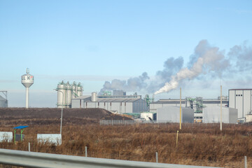 industrial factory emitting smoke