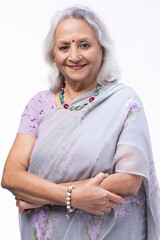 Portrait of smiling senior woman in traditional Indian sari