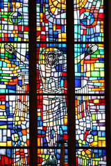 Portrait of Jesus on stianed glass window in church