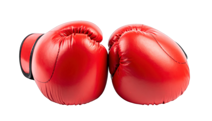 Two bright red boxing gloves, side by side, isolated on a stark black background