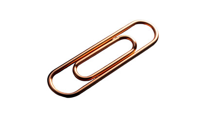 Obraz premium A shiny copper paper fastener isolated against a stark, black background
