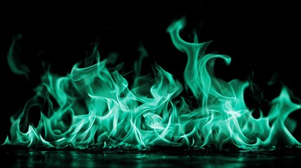 Macro wallpaper with green flames on a black background.
