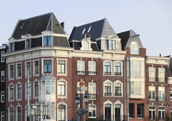 Fototapeta premium Amsterdam Amstel House Facades near the Blauwbrug Bridge, Netherlands