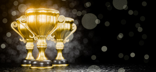 Golden winner's cups as a reward. Achievements. Victory. Goal achievement concept. Prize place. First place in a computer game. Award for outstanding achievements. Winners' cup. 3D render.