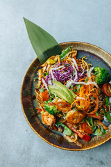 Fresh wok bowl with vegetables nuddles and shrimps