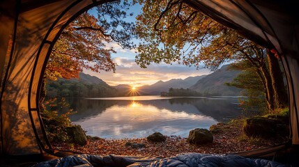 Sunrise Over Calm Mountain Lake with Autumn Foliage Seen From Inside a Tent.