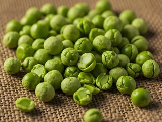 A pile of wasabi peas on burlap
