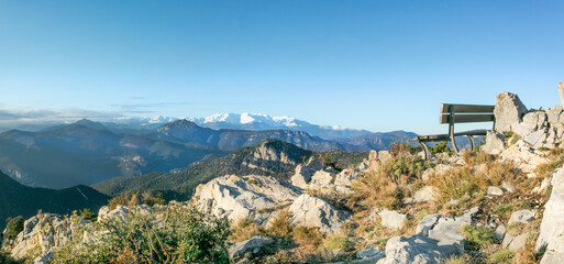  bench and view ,sunset in the mountains on Mare de Deu del Mon in Girona, Catalonia, Spain