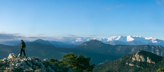 view of the mountains whit man  on Mare de Deu del Mon in Girona, Catalonia, Spain