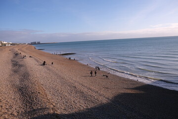 walking on the beach Brighton beach in December 