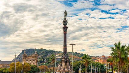 Columbus Square with Montjuic Mountain in the background at sunset on a summer's day, Barcelona, Spain.