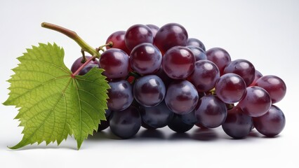 Fresh red and purple grapes with a green leaf, isolated on white background