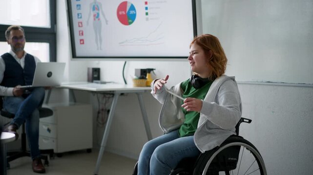 Disabled teen girl presenting AI learning project in classroom.