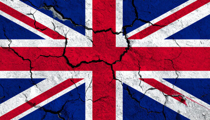 Cracked UK flag on concrete wall texture, distressed Union Jack background