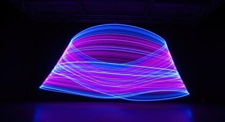 Glowing abstract light trails swirl in a dark space, creating a futuristic, ethereal design