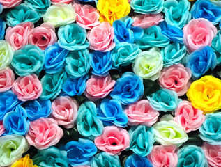 bunch of colorful fabric roses background