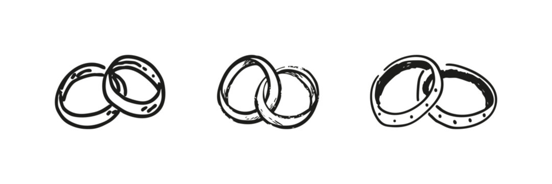 Interlocking Wedding Rings Set In Doodle Style. Symbol Of Love, Commitment, And Marriage Sketch Collection. Hand Drawn Isolated Vector Illustration