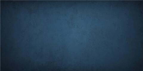 A dark blue grunge blackboard background featuring an old textured wall pattern and a rough vintage paper surface for a blank backdrop design © Faysal