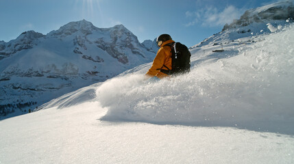Skier riding in the scenic Dolomites mountains in fresh po . Super slow motion at 1000 fps.