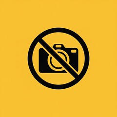 No photography allowed sign on yellow background