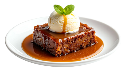 Decadent dessert, brownie-like square with ice cream, caramel sauce & mint on white plate