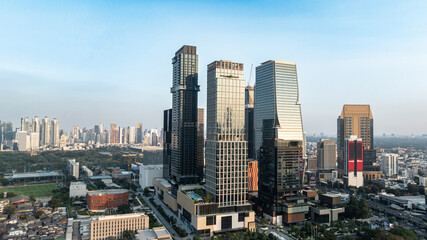 Fototapeta premium Modern City Skyline with High Rise Office Buildings and Business District Concept of corporate business, real estate development, urban growth, and modern metropolitan lifestyle