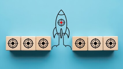 Businessman launching rocket from wooden blocks on blue background