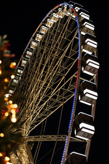 Christmas Market Ferris Wheel with Festive Lights in Paris