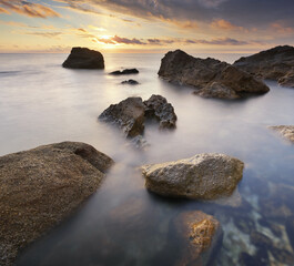 Beautiful seascape of calm sea at sunset.