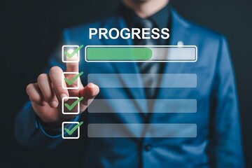 Businessman tracking progress on digital checklist