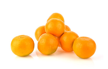 Heap of  Mandarin or Tangerine orange fruit on a white background.