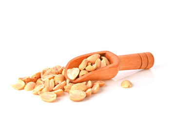 Heap of Roasted peanuts in the wood scoop isolated on white