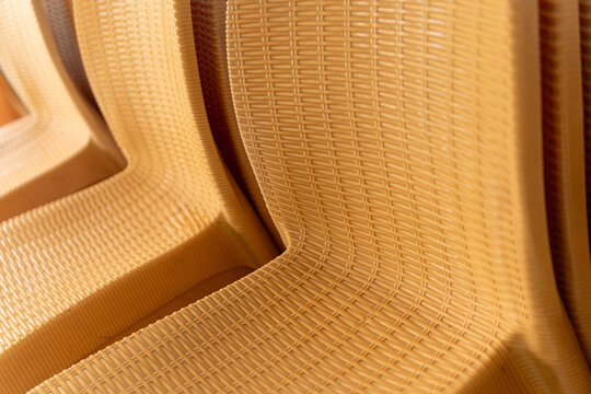 Close Up of Woven Pattern Plastic Chairs