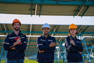 Engineers are working at solar farm.