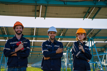 Engineers are working at solar farm.