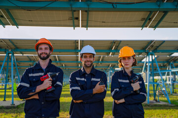 Engineers are working at solar farm.
