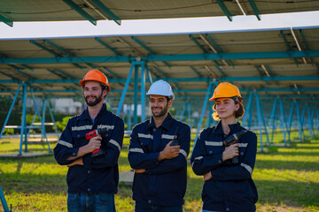 Engineers are working at solar farm.