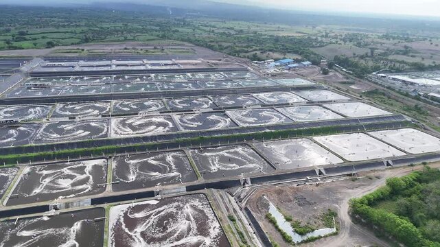 Aerial View of Large Scale Commercial Aquaculture Farm with Aerated Ponds
