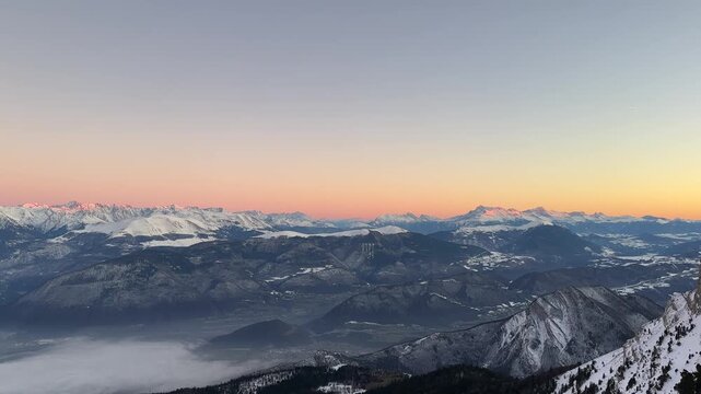 Panoramic view from the Vercors mountain range at sunset in winter 