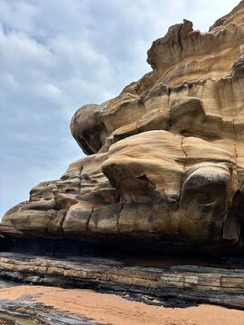 Rock formation along coastal shoreline
