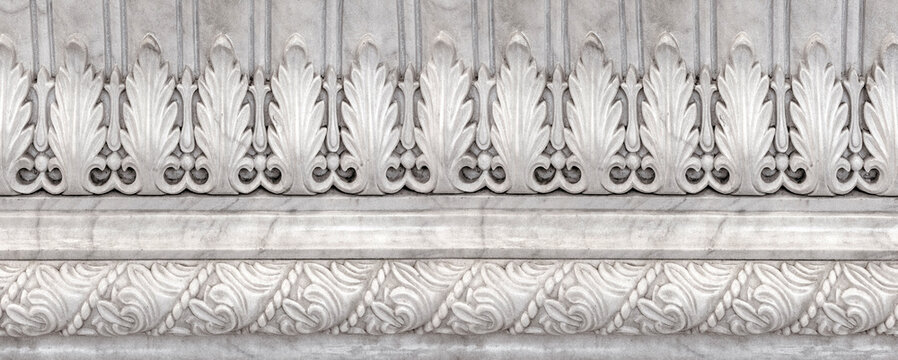 White marble architectural carving details displaying acanthus leaves