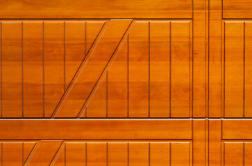 Nahaufnahme eine Holzt&uuml;r mit gemaserter Struktur.