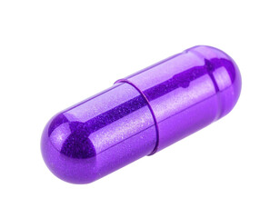A close-up shot of a purple, elongated capsule against a stark black background