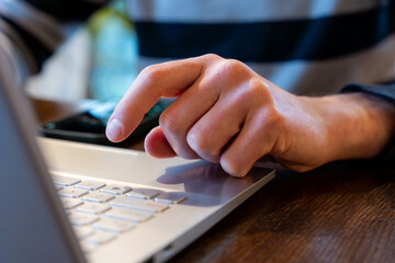 Hand Clicking Laptop Key Or Touchpad To Move Cursor, Online Work And Computer Interface Navigation For Remote Office Browsing And Daily Productivity